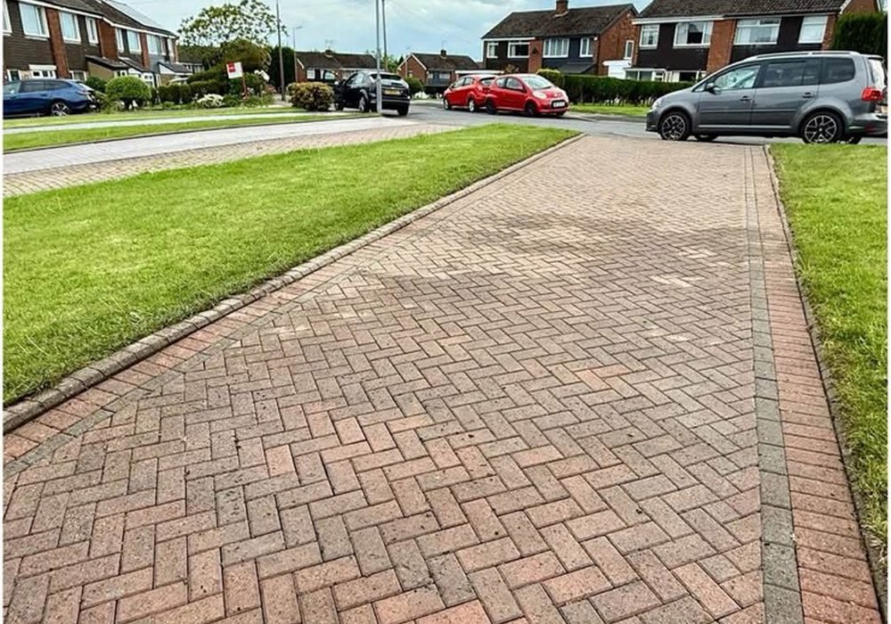 Paved driveway after cleaning