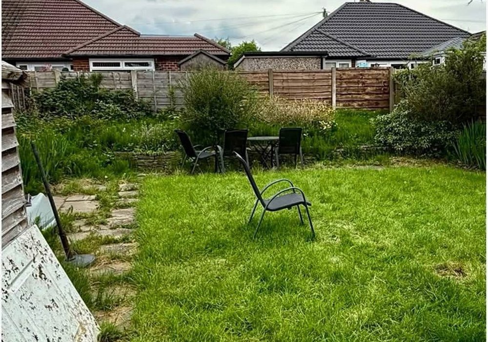 Garden border ready for clearing and maintenance